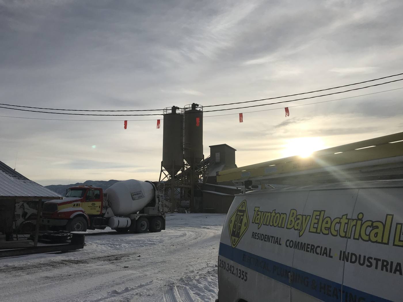 Taynton Bay Electrical service van on an industrial concrete plant site