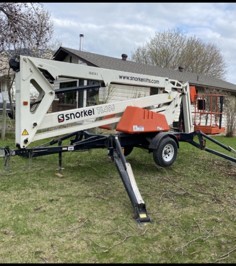 Snorkel towable boom lift stowed and ready for transport