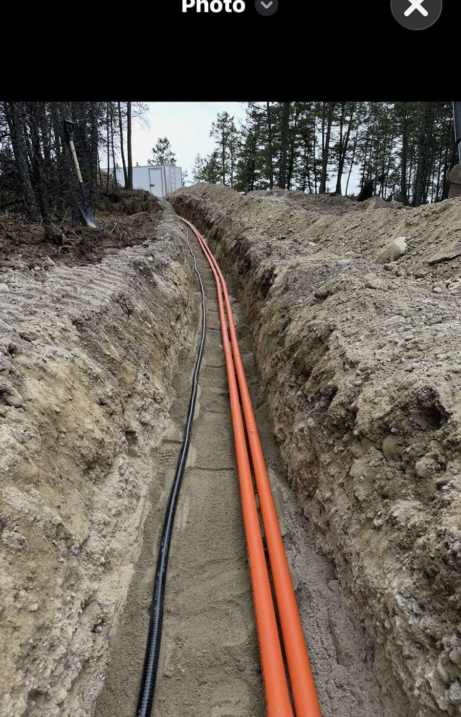 Trench with conduit runs for underground electrical service